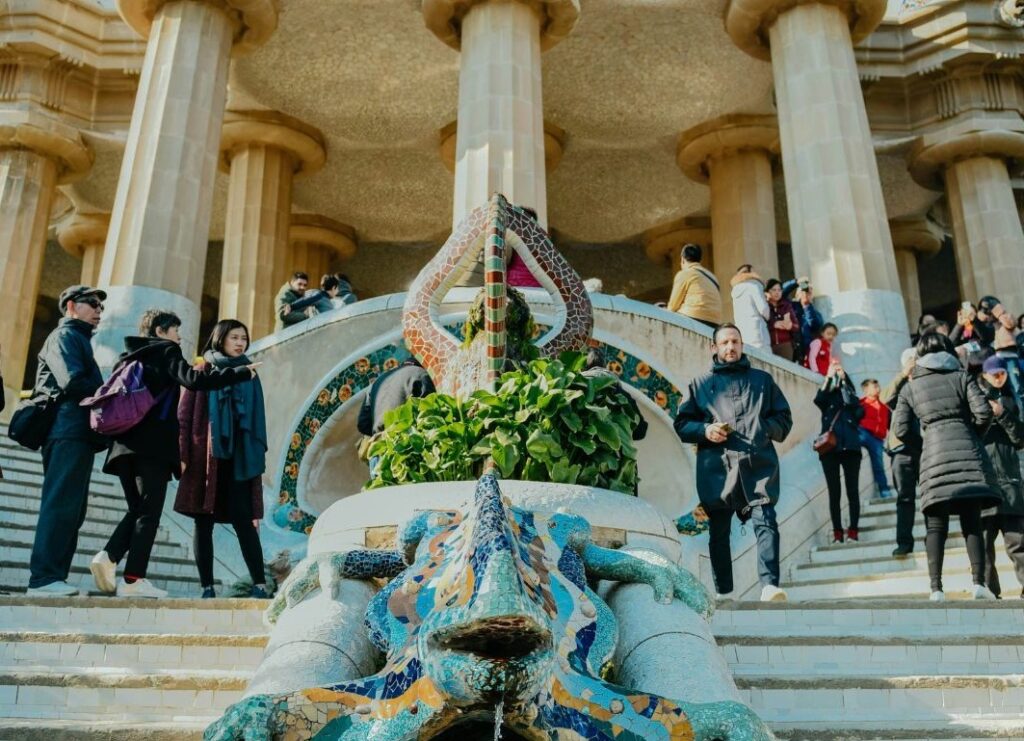 Park Guell main staircase Barcelona Gaudi design and tourists